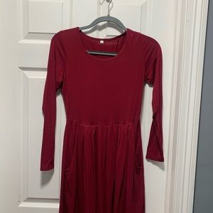 Women’s long sleeve casual dress. Loose fit. With pockets.